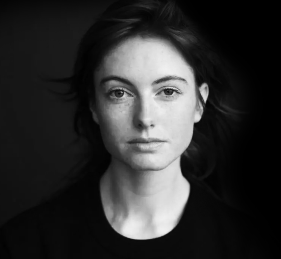 A black and white photo of a woman.